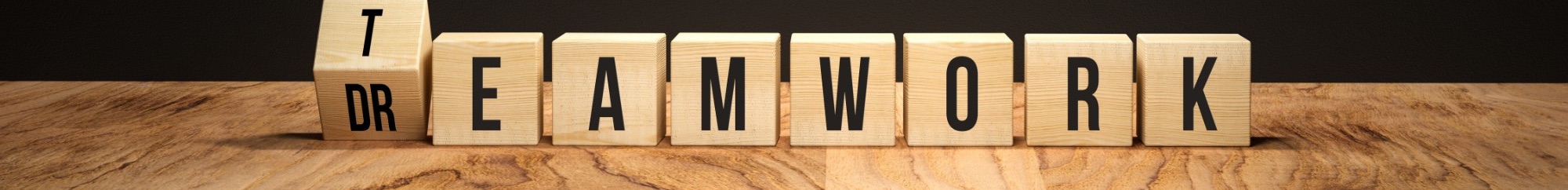 Wooden blocks spelling TEAMWORK